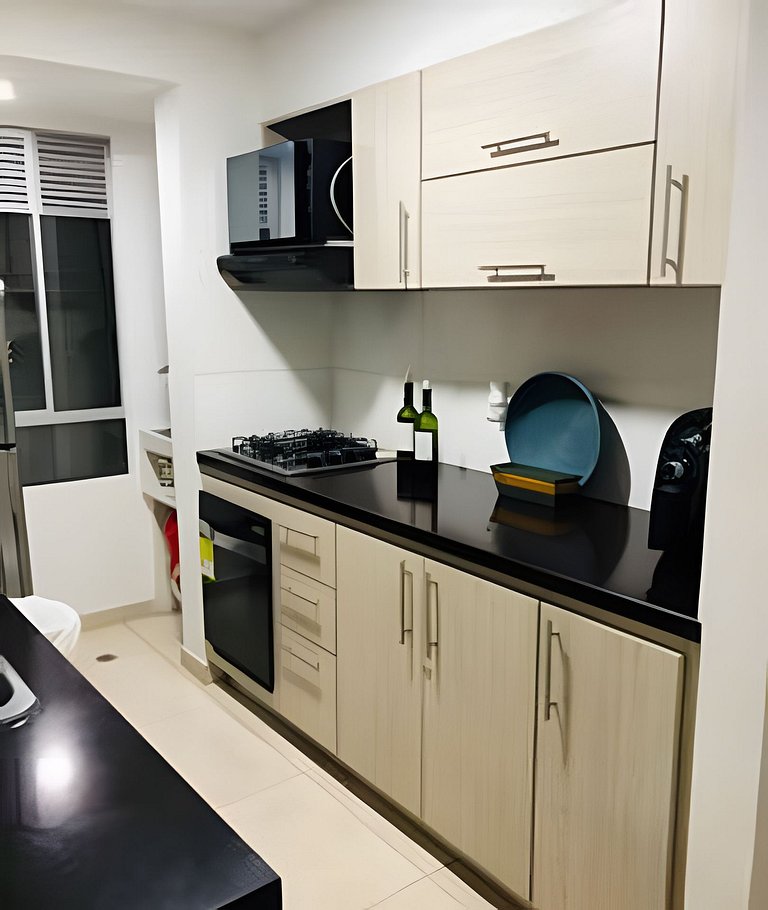 Apartamento con aire, hamaca, piscina y gym