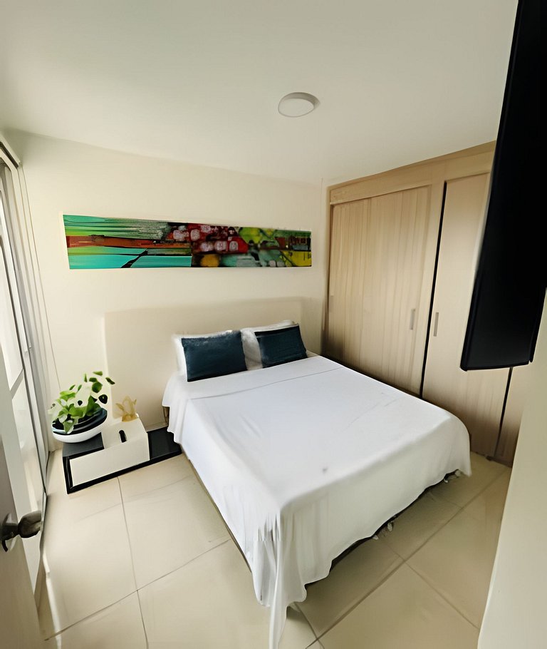 Apartamento con aire, hamaca, piscina y gym