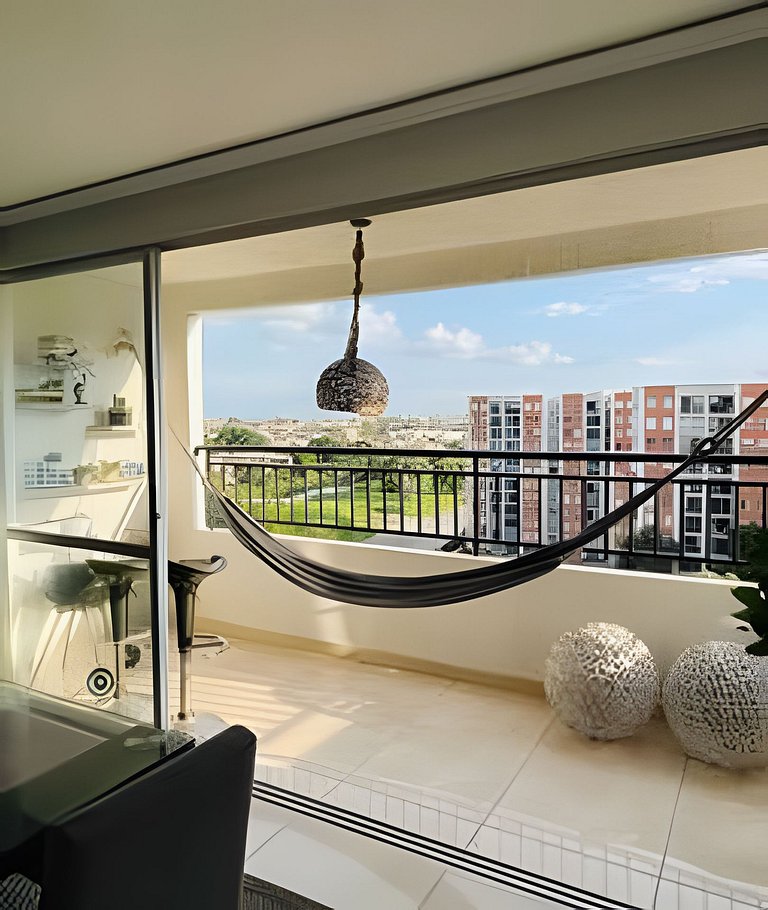 Apartamento con aire, hamaca, piscina y gym